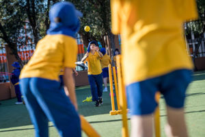Students at St Catherine Labouré Catholic Primary School Gymea playing cricket